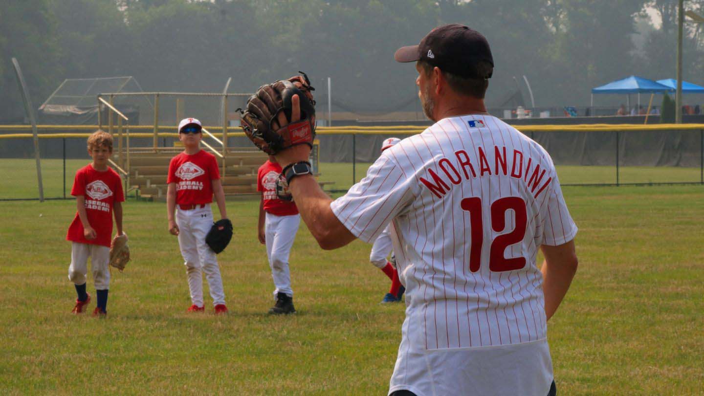 Mickey Morandini having a catch with campers