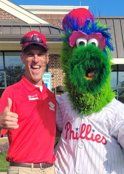 Scott Rourke with the Phillie Phanatic